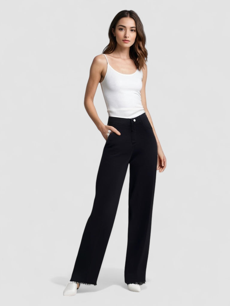 Sisu™ | Elegant Black Jeans with Raw Finish